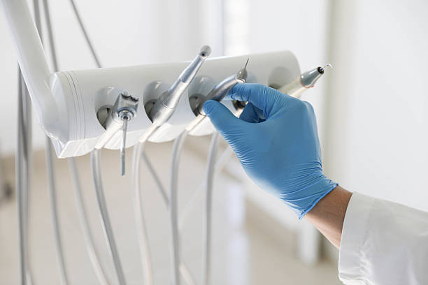 Professional Tooth Extraction technician working in Norfolk, VA